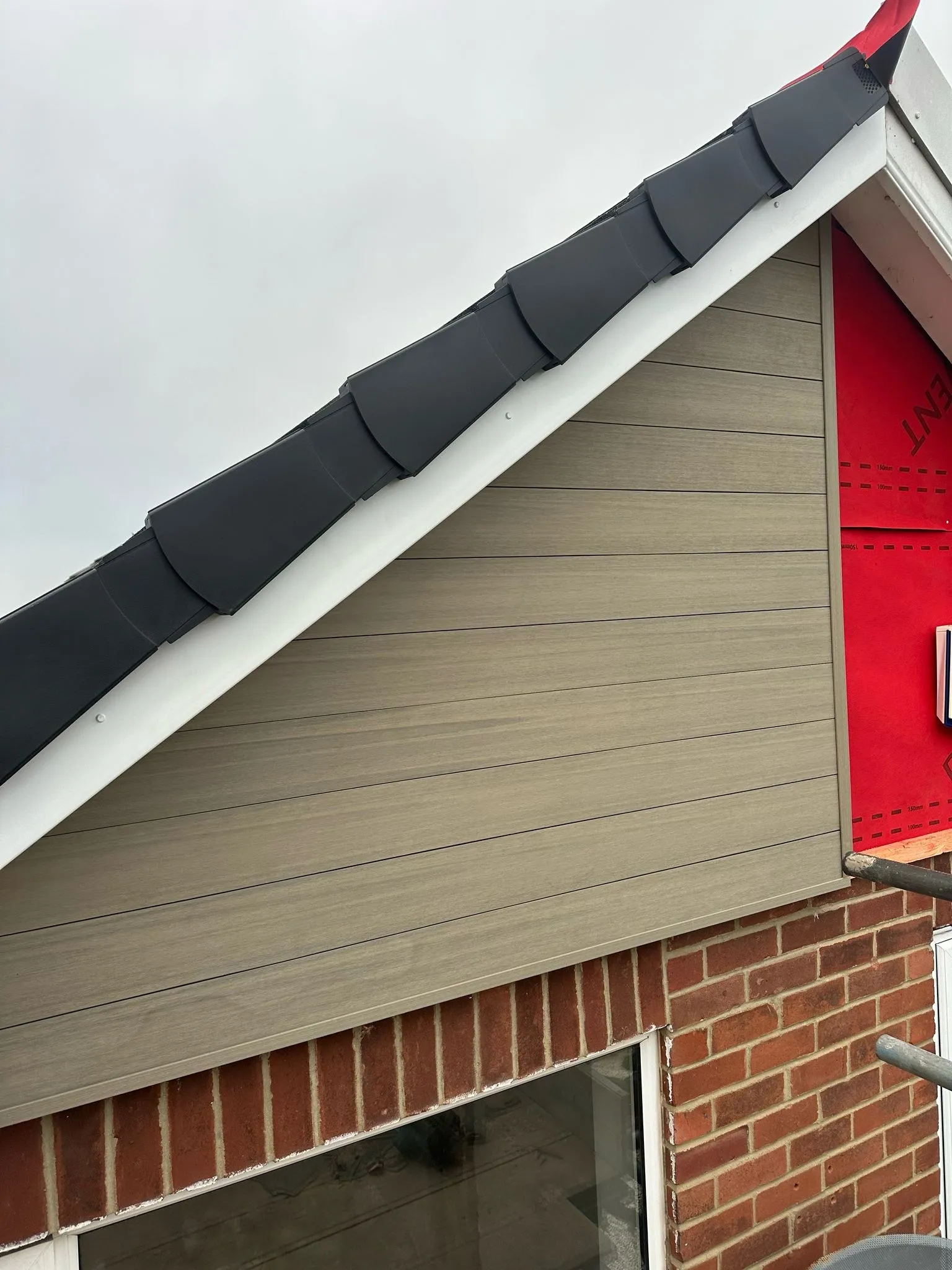 Dry verge and cladding detail on a gable
