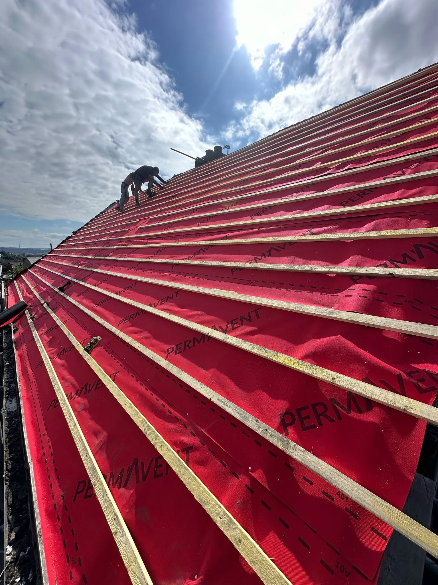 Breathable membrane and new battens fitted before the tiles go on