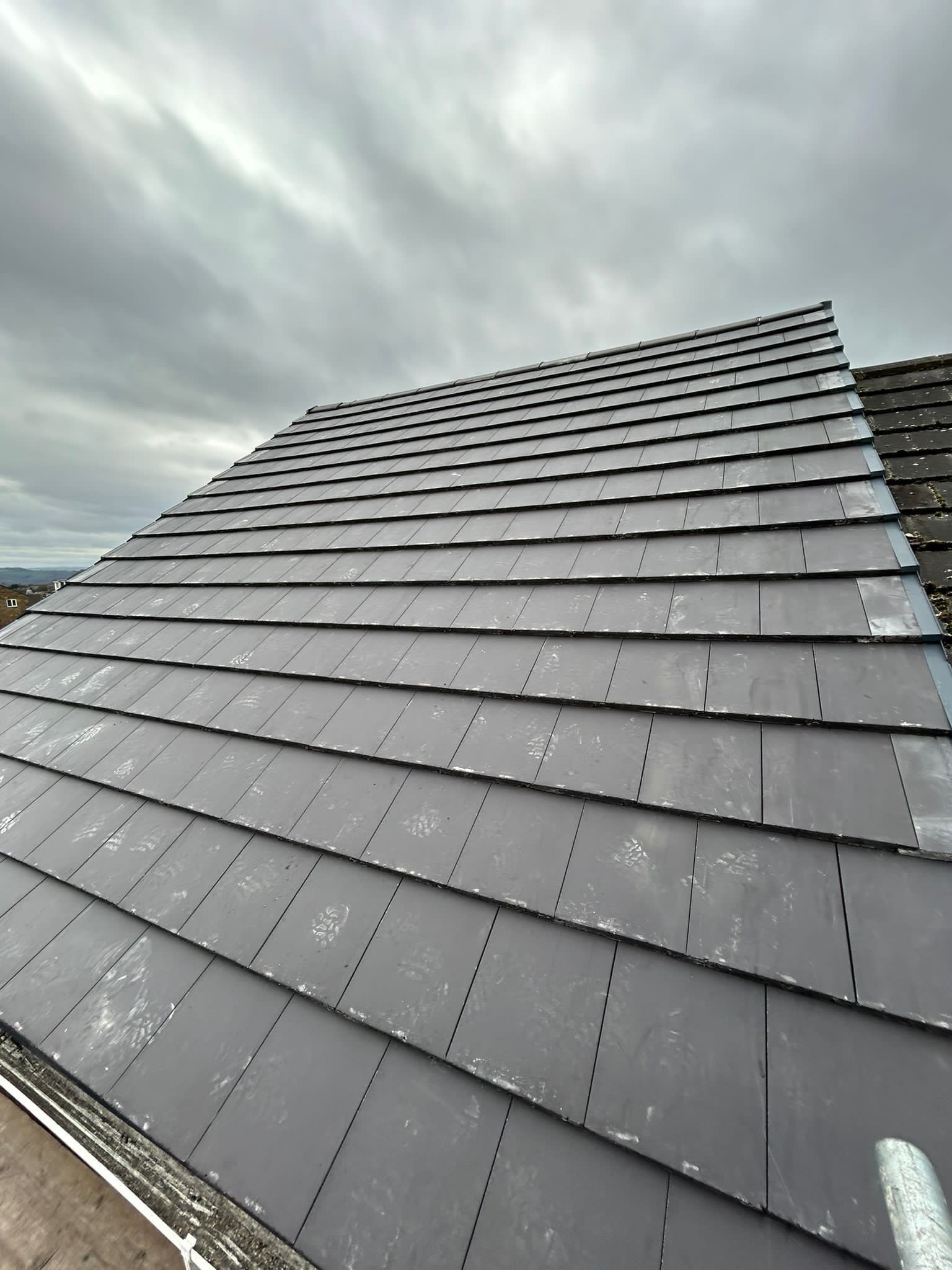 Close-up of slate-effect roof tiles